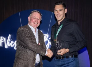 Taverner National Chairman John Jeffreys presenting Scott Boland with the Taverners Indigenous Player of the year award in 2019
